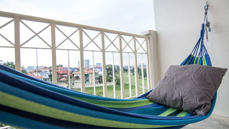 Balcony hammock overlooking the golf course at Stadium Suite 1