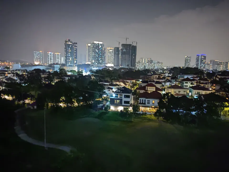 Night view over the golf course and Bukit Jalil from a Stadium suite